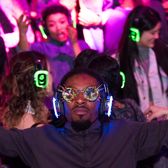 Quiet Events Silent Disco headphones for run walks. Various participants having fun wearing headphones.