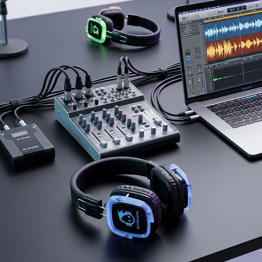 Podcast mixer connected to laptop and RF silent disco transmitter