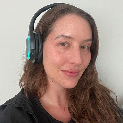 Sarah Caponi with silent disco headphones on.