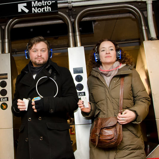 Public event with traditional speakers causing nearby sound friction