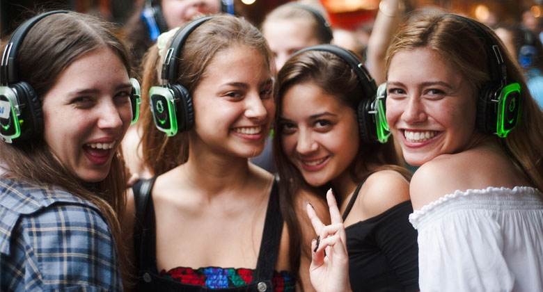Girls enjoying the group pic with headphones