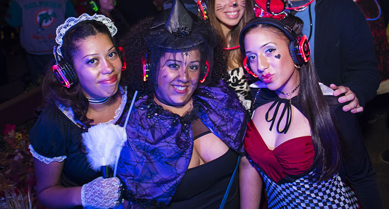 Three woman in halloween costumes